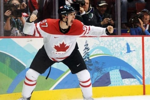 A photo of Sidney Crosby celebrating his winning goal against the USA in the 2010 Olympics.