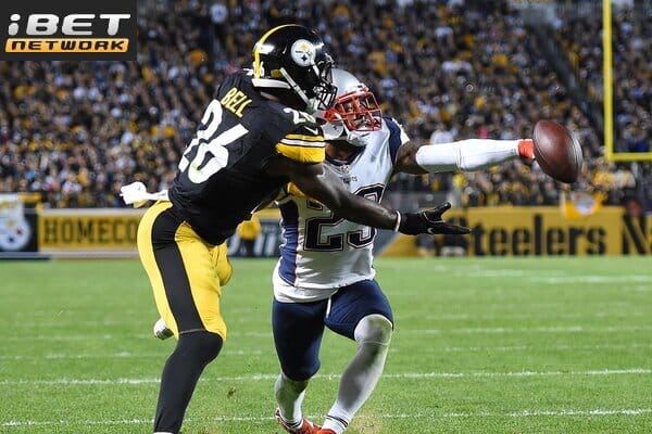 This is a picture of the Steelers against the Patriots for the NFL week 14 Picks article