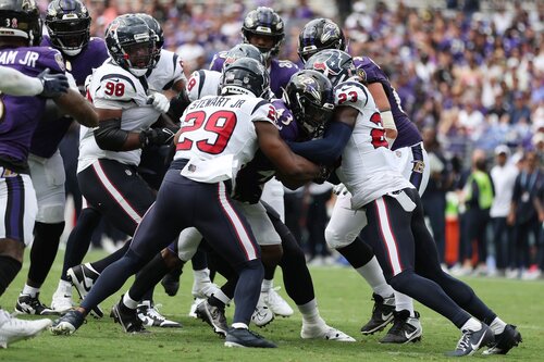 This is a picture of the Texans against the Ravens for the NFL Divisional Round Picks article 