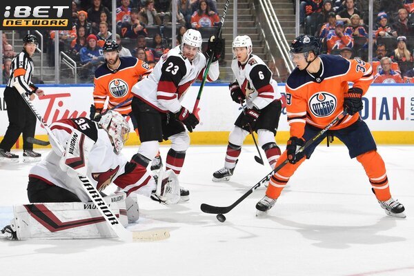 This is a picture of the Oilers against the Coyotes for the NHL Picks article preview