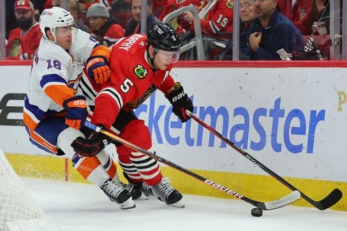 This is a picture of the Blackhawks against the Islanders for the NHL Picks article preview