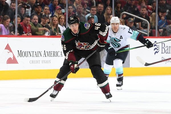 This is a picture of the Coyotes against the Kraken for the NHL picks article preview