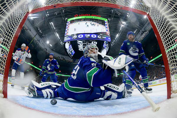 This is a picture of the Oilers against the Canucks for the NHL playoff picks article