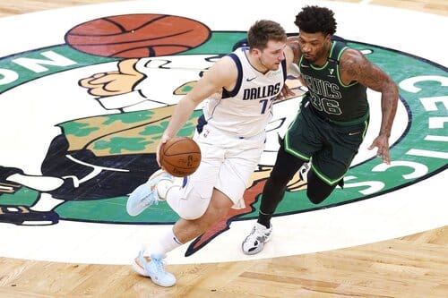 This is a picture of the Mavericks against the Celtics for the 2024 NBA Finals article 