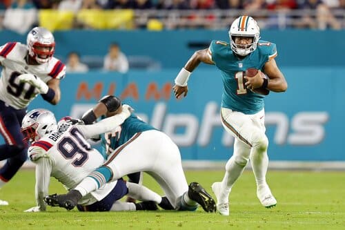 This is a picture of the Dolphins against the Patriots for the NFL Picks week 5 article preview